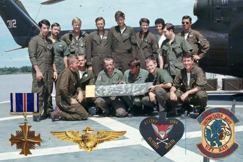 Seawolf detachment crew with medals and patches